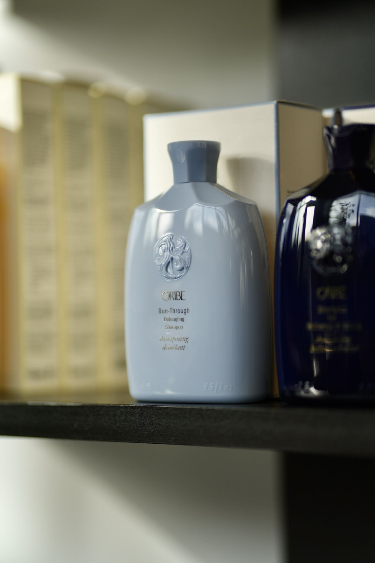 Close-up of an Oribe shampoo bottle