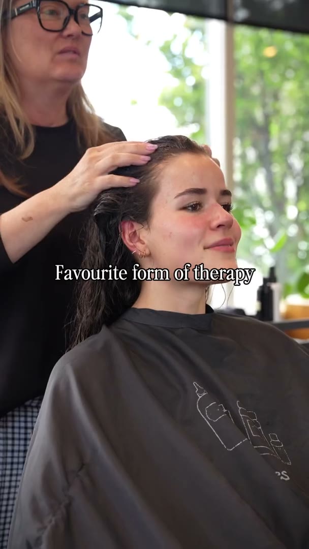 Best Kelowna Hair Salon: Stylist giving a client a relaxing scalp massage at MOD Salon